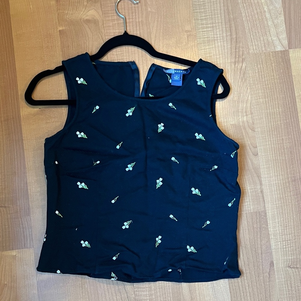 Elegant Navy Sleeveless Top with Floral Accents